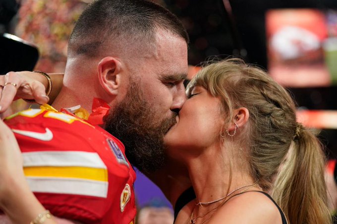 Love in the air! Taylor Swift kisses Travis Kelce on the field after Kansas City Chiefs win the Super Bowl (video)