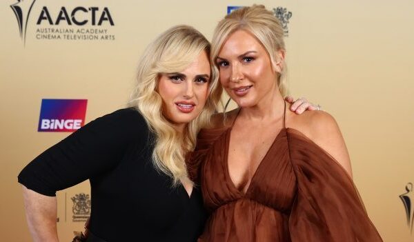 Rebel Wilson and Ramona Agruma posing for red carpet pictures