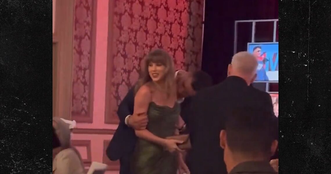 Travis Kelce Covers Taylor Swift’s Arm With Kisses At Las Vegas Gala