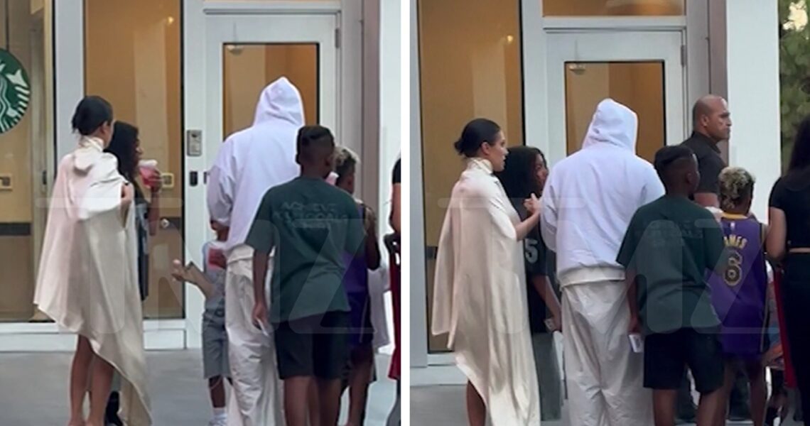 Bianca Censori Wears Loose Poncho for Target Run With Kanye West & Kids