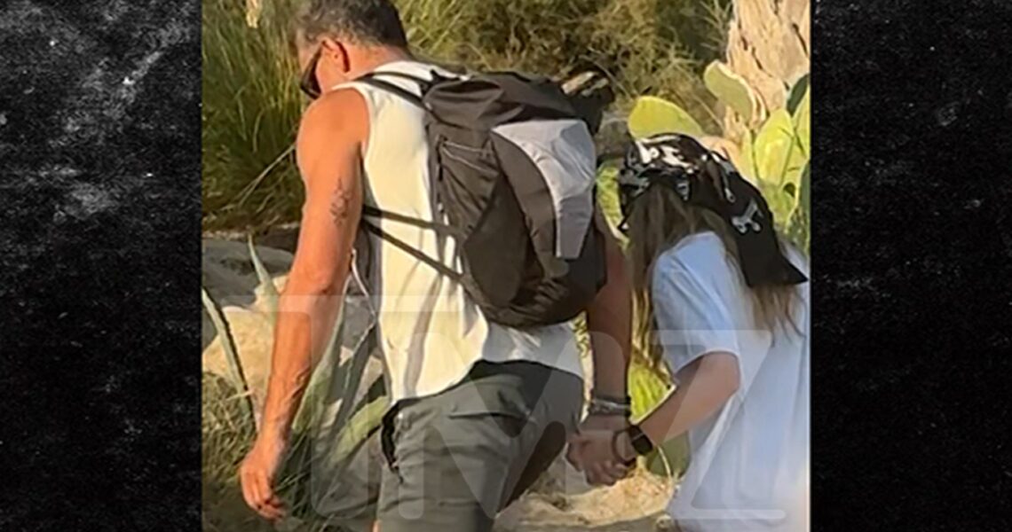 Mauricio Umansky Snuggles Up With Actress Nikita Kahn In Greece