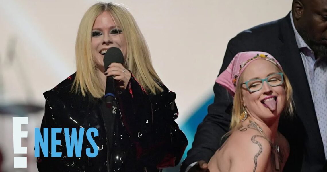 Avril Lavigne Confronts Topless Protestor at 2023 Juno Awards | E! News