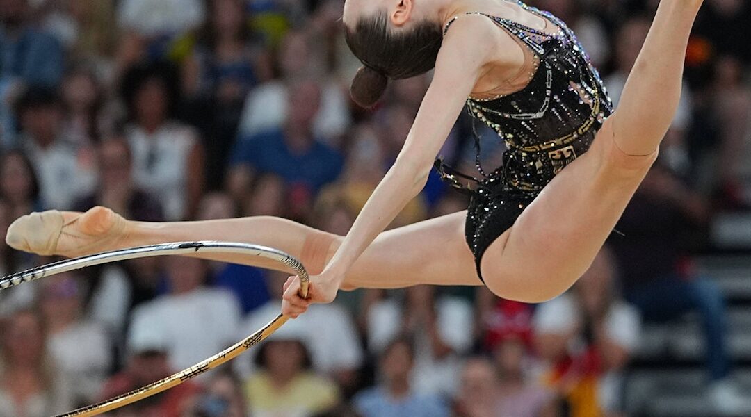 Flip Through How Artistic & Rhythmic Gymnastics Differ at the Olympics