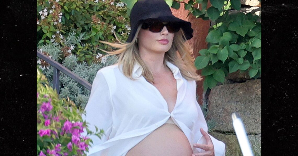 Margot Robbie Shows Baby Bump On Sardinian Vacation With Hubby Tom Ackerley