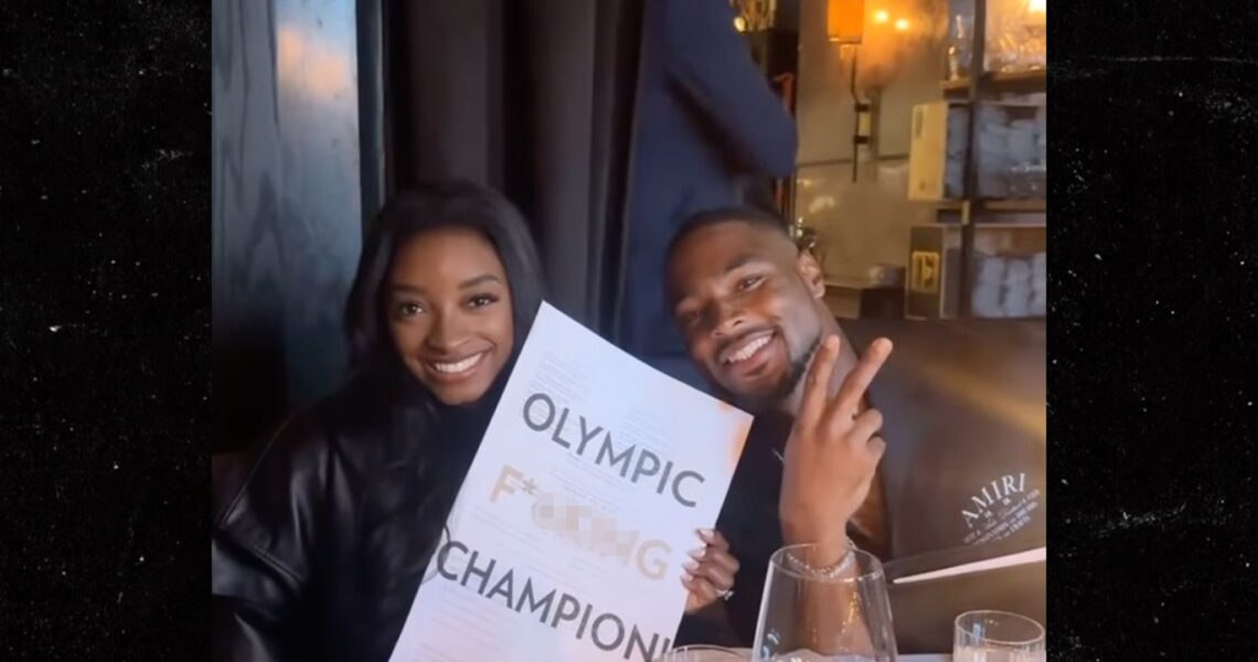 Simone Biles Poses with ‘Olympic F***ing Champion’ Menu